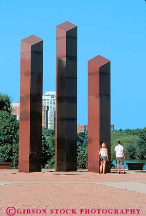 Stock Photo #11358: keywords - abstract art couple couples man memorial memorials milwaukee monument monuments nam pair public stone symbol symbolic together vert veterans viet war wisconsin woman