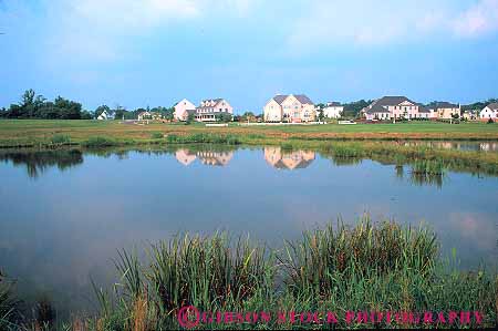 Stock Photo #14224: keywords -  aquatic building buildings calm country countryside flat habitat home homes horz house houses in lake lakes landscape mirror neighborhood neighborhoods new pennsylvania pond ponds quiet reflect reflecting reflection reflections reflects remote rural scenery scenic still water wetland wetlands