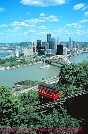 Stock Photo #3329: keywords -  bridge bridges building city cityscape downtown duquesne duquesne_incline incline landscape monongahela pennsylvania pittsburgh river scenery scenic skyline vert