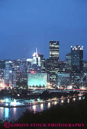 Stock Photo #7690: keywords -  america american architecture building buildings business center cities city cityscape cityscapes dark downtown dusk evening high lighting lights modern monongohela new night office pennsylvania pittsburgh rise river skyline skylines urban usa vert water