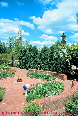 Stock Photo #11221: keywords -  botanical brick child children conservatory flower flowers garden gardens girl girls look looking outdoor outside patio pennsylvania phipps pittsburgh released see seeing smell smelling sniff sniffing summer vert wall