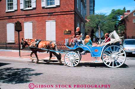 Stock Photo #12777: keywords - buildings carriage carriages cities city cityscape cityscapes downtown horse horses horz pennsylvania philadelphia ride riders riding tour touring tourist tourists tours urban