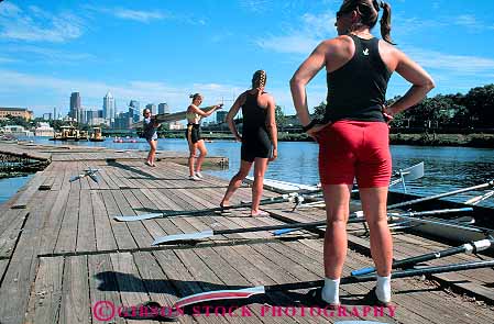 Stock Photo #12778: keywords -  buildings cities city cityscape cityscapes downtown female horz pennsylvania philadelphia river rivers row rowing schuylkill summer teams urban woman women