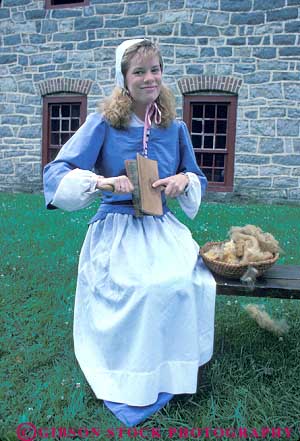 Stock Photo #19737: keywords - bethlehem card carding cards colonial costume costumed costumes dressed era girl heritage historic history industrial lifestyle living local museum museums old pennsylvania person portray portraying portrays quarter reenact reenacting reenactment site sites tradition traditional vert vintage woman wool young