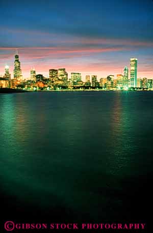 Stock Photo #7701: keywords -  america american architecture bright building buildings business center chicago cities city cityscape cityscapes dark downtown dusk evening high illinois lake lighting lights michigan modern new night office rise skyline skylines urban usa vert