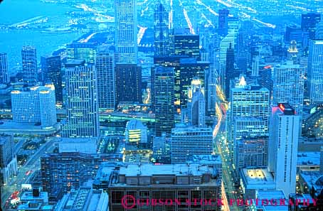Stock Photo #7703: keywords -  america american architecture building buildings business center chicago cities city cityscape cityscapes dark downtown dusk elevate elevated evening high horz illinois lighting lights modern new night office rise skyline skylines urban usa view