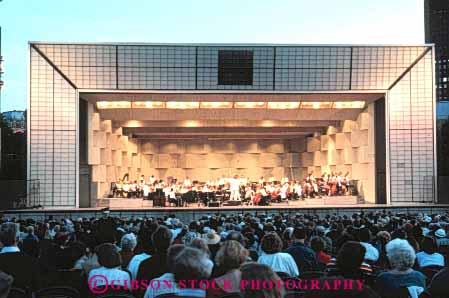 Stock Photo #8972: keywords -  band chicago concert dark destination dusk evening grant horz illinois lighting lights orchestra park people perform performance performing shell show summer tourist tourists travel traveler travelers