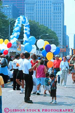 Stock Photo #8974: keywords -  activity annual balloon balloons chicago child children destination ethnic event events fair fairs festival festivals gather gathering group groups hispanic illinois latino minority people summer tourist tourists travel traveler travelers vert viva