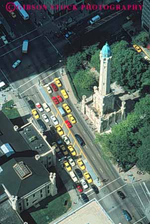 Stock Photo #8976: keywords -  aerial aerials and architecture auto autos cab cabs car cars chicago downtown elevate elevated illinois monument street streets streetscape tall taxi tower urban vert view water