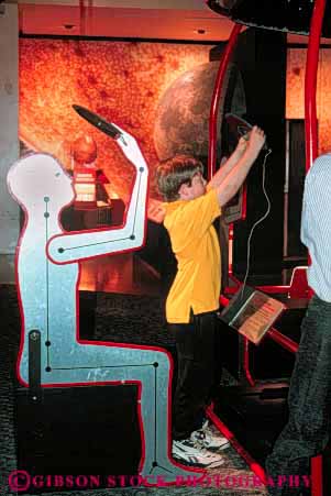 Stock Photo #8983: keywords - adler boy boys celestial chart chicago child educate educates education illinois learn night planetarium planetariums reads sky star stars vert