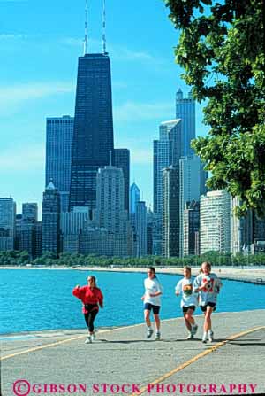 Stock Photo #8987: keywords -  chicago exercise exercising fitness friend friends group health illinois jog jogger joggers jogging lakefront leisure outdoor outside people recreation run runner runners running runs sport sports summer team together vert woman women workout