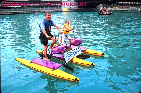 Stock Photo #8993: keywords -  bicycle bike boat boating chicago child daughter father float girl horz hydrobike illinois leisure man material outdoor outside parent peddle people plastic recreation rent rental renting ride river single synthetic tour water