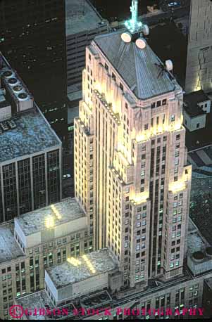Stock Photo #9001: keywords -  aerial aerials architecture board building buildings chicago cities city downtown dusk elevated illinois illuminate illuminated lighting lights of office overhead trade urban vert view