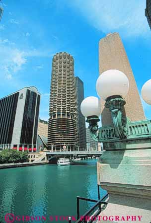 Stock Photo #9003: keywords - boat boating boats chicago cities city design downtown illinois lamp lamps river riverfront street streets streetscape style tour tours urban vert