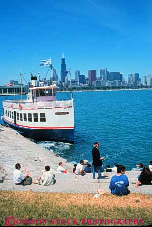Stock Photo #9018: keywords -  boat chicago cityscape cityscapes downtown front illinois lake people relax relaxed relaxing shore skyline skylines summer tour urban vert