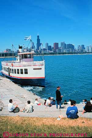 Stock Photo #9018: keywords - boat chicago cityscape cityscapes downtown front illinois lake people relax relaxed relaxing shore skyline skylines summer tour urban vert