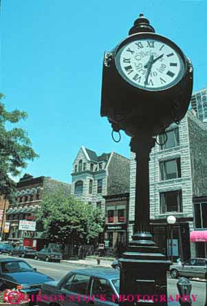 Stock Photo #9020: keywords -  building buildings chicago clock clocks community district downtown illinois neighborhood neighborhoods old older street streets tower town tradition traditional vert