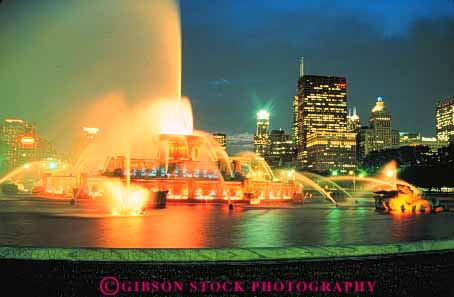 Stock Photo #9027: keywords -  bright buckingham chicago colorful dark display downtown dusk evening fountain horz illinois illuminate illuminated illuminates lighting lights night skyline skylines spray urban water