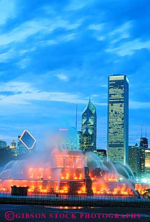 Stock Photo #9028: keywords -  bright buckingham chicago colorful dark display downtown dusk evening fountain illinois illuminate illuminated illuminates lighting lights night skyline skylines spray urban vert water