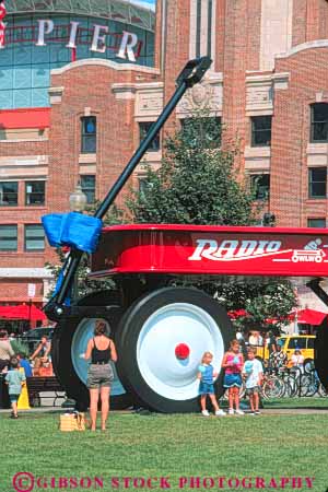 Stock Photo #9031: keywords -  activities activity amusement attraction big chicago child children difference different fun game games giant gigantic huge illinois little navy park pier play recreation ride rides scale sculpture sculptures size summer tourist toy travel vert wagon wheel