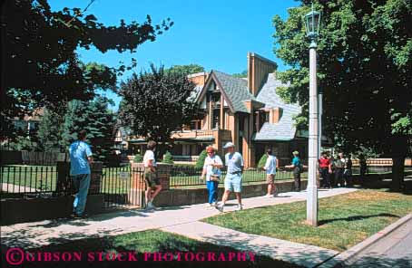 Stock Photo #9047: keywords -  architect architecture brick building buildings chicago design designed famous frank group groups guided home homes horz house houses illinois landmark lloyd modern moore nathan oak park people roof slate slope slopes sloping steep style tour tours wright