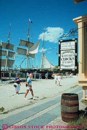 Stock Photo #9918: keywords -  american attraction boat boats coast coastal connecticut england harbor harbors historic history marina marinas mystic new ocean old people port restored rustic sail sailing sea seaport seashore ship ships shore shoreline site sites tourist vert vintage