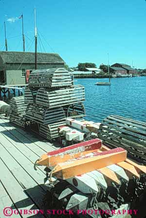 Stock Photo #9921: keywords -  american attraction boat boats coast coastal connecticut dock docks england equipment fishery fishing harbor harbors historic history lobster marina marinas mystic new ocean old port restored rustic sail sailing sea seaport seashore ship ships shore shoreline site sites tackle tourist vert vintage