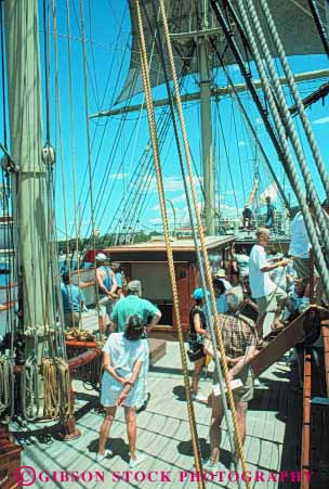 Stock Photo #9922: keywords -  american attraction boat boats coast coastal connecticut conrad deck england harbor harbors historic history j marina marinas mystic new ocean of old people port restored rustic sail sailing sea seaport seashore ship ships shore shoreline site sites tourist vert vintage