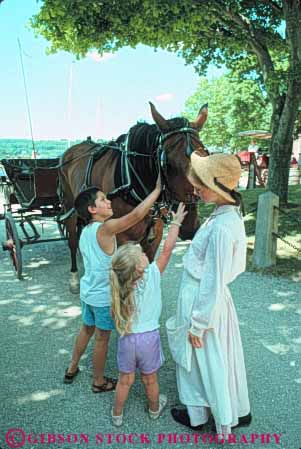 Stock Photo #9928: keywords -  american attraction boat boats child children coast coastal connecticut england harbor harbors historic history horse horses kids marina marinas mystic new ocean old pet petting port restored rustic sail sailing sea seaport seashore ship ships shore shoreline site sites touch tourist vert vintage