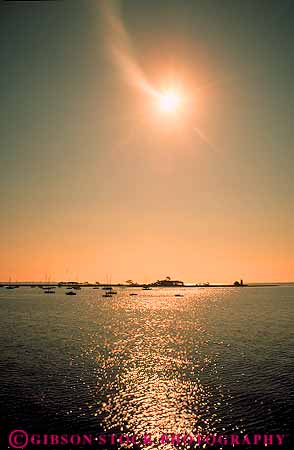 Stock Photo #14256: keywords -  boat boats bright calm connecticut dawn england glare glares glaring hot landscape marina marinas mood moody moored new ocean peaceful quiet reflect reflecting reflection reflections reflects region scenery scenic sea seascape serene sun sunny sunrise vert warm water