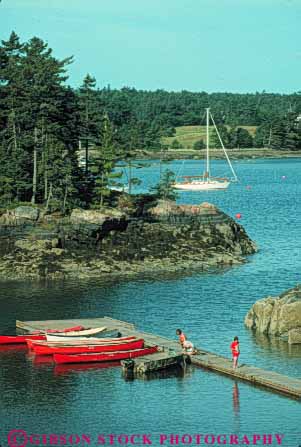 Stock Photo #9264: keywords -  bay boat boats calm child children coast coastal dock docks england girls lagoon lagoons maine new ocean seashore shore somesville still summer vert warm