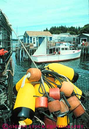 Stock Photo #9266: keywords -  and boat boats coast coastal colorful dock docks england fishing float floats ilesford lobster maine new ocean seashore shore vert