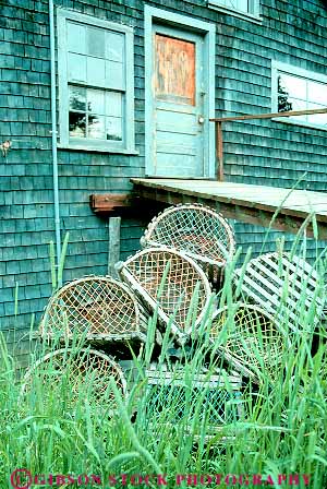 Stock Photo #14282: keywords -  aged and bass building coast coastal england harbor house lobster maine new ocean old region romantic sea shack shacks shore shoreline tradition traditional traps vert vintage weathered