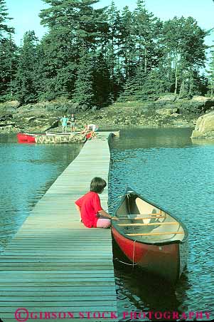 Stock Photo #14283: keywords -  boating calm canoe canoes child children coast coastal cove coves dock docks england girl girls maine new ocean people region sea shore shoreline somesville vert