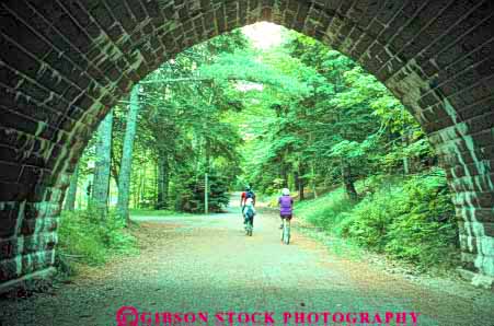 Stock Photo #9174: keywords -  acadia bicycle bicycles bicycling bike biker bikers coast coastal england family horz maine national new park parks recreation ride riders riding seashore shore shoreline through trail tunnel vacation