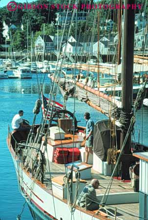 Stock Photo #9183: keywords -  boat boats camden coast coastal crew england harbor harbors in maine marina marinas new people port schooner schooners ship ships shore shoreline summer vert