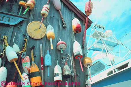 Stock Photo #14295: keywords -  coast coastal decorate decorates decoration england float floats hanging horz kennebunkport lobster maine new region shed shore shoreline trap traps wall walls