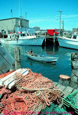 Stock Photo #14307: keywords -  boat boating boats coast coastal dock docks england fisherman fishermen fishing harbor harbors maine marina marinas motorboat motorboats motoring net nets new ocean of out port portland region sea seashore shore shoreline vert wharf wharfs