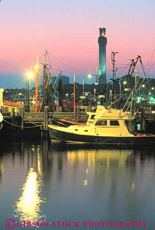 Stock Photo #9200: keywords -  attraction boat boats cape cod dark destination dock dusk england evening fishing lighting lights massachusetts new night pier provincetown reflection reflects resort resorts summer tourist travel vacation vert