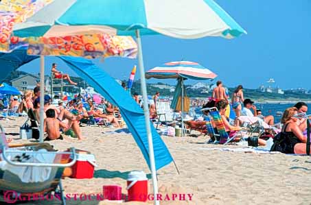 Stock Photo #9202: keywords -  attraction beach beaches cape centerville cod color colorful destination england horz massachusetts new people resort resorts sand shade summer sunbathing sunny sunshine tourist travel umbrella umbrellas vacation