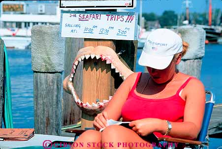 Stock Photo #14314: keywords -  and boat cape charter coast coastal cod destination dock docks england horz hyannis jaw jaws massachusetts mouth new ocean region resort resorts sea seashore shark sharks shore shoreline summer sunny sunshine teeth travel trip trips vacation warm water woman