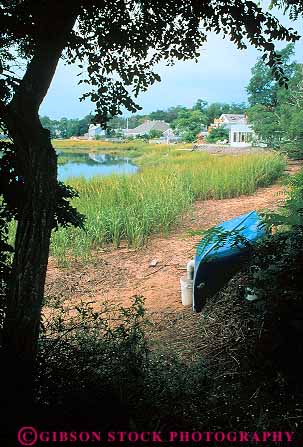 Stock Photo #14317: keywords -  canoe cape coast coastal cod destination edge england home homes houses lagoon lagoons marsh massachusetts new ocean of region resort resorts sea seashore shore shoreline summer sunny sunshine travel vacation vert warm water wellfleet wetland wetlands