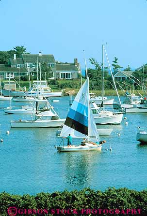 Stock Photo #14318: keywords - boating boats cape coast coastal cod cove coves destination england harbor harbors harwich lagoon lagoons marina marinas massachusetts new ocean people port recreation region resort resorts sail sailboat sailboats sailing sails sea seashore shore shoreline summer sunny sunshine travel vacation vert warm water
