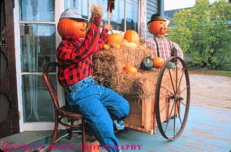 Stock Photo #9242: keywords -  autumn character colorful costume costumes cute different display england fall foliage funny harvest horz massachusetts new pumpkin pumpkins scarecrow season unusual wagon