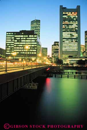 Stock Photo #7706: keywords -  america american architecture boston bright building buildings business center cities city cityscape cityscapes downtown england high lighting lights massachusetts modern new night office rise skyline skylines urban usa vert water waterfront