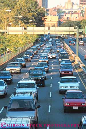 Stock Photo #9738: keywords -  and auto automobiles autos boston bumper busy car cars cities city crowded dense divided drive england evening highway highways hour jam lots many massachusetts new rush slow slowly stop stopped stopping stops storrow street streets tight traffic urban vehicle vehicles vert