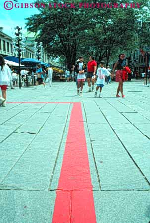 Stock Photo #9749: keywords - activities activity boston cities city directing direction directions england follow following follows freedom fun guide guides guiding indicator indicators line lines massachusetts new paint painted path paths pavement people play recreation red route routes sport sports strip strips trail trails urban vert