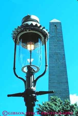 Stock Photo #9769: keywords -  american antique boston bunker burn burns cities city england flame flames gas hill historic history lamp lamps light lighting lights massachusetts monument near new old site sites tradition traditional urban vert vintage
