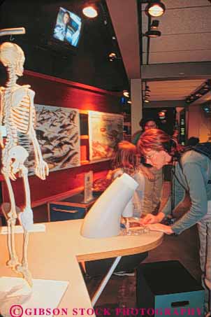 Stock Photo #9771: keywords -  activities activity aquarium aquariums boston cities city display displays england exhibit exhibits hands interactive learn learning massachusetts microscope microscopes museums new public recreation science urban vert woman