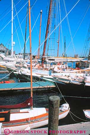 Stock Photo #9788: keywords -  bay boat boats boston cities city dock docks england in long marina marinas massachusetts new ocean sailboat sailboats sailing sea tour vert waterfront wharf wharfs
